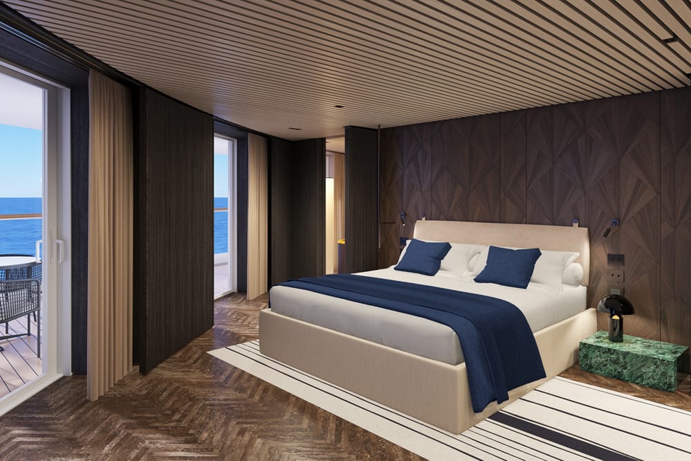 La chambre à coucher de la suite "The Haven Deluxe Suite" avec grand balcon.