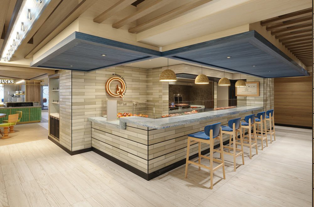 Le restaurant Q Texas Smoke House est situé dans l'Indulge Food Hall